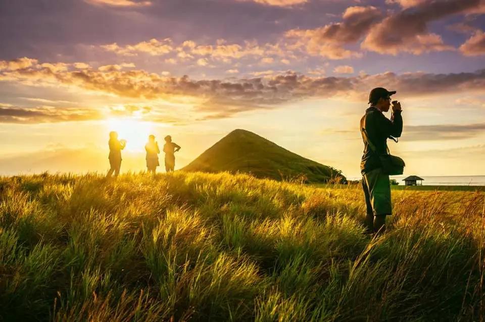 Sunset over the savanna hills of Kenawa Island