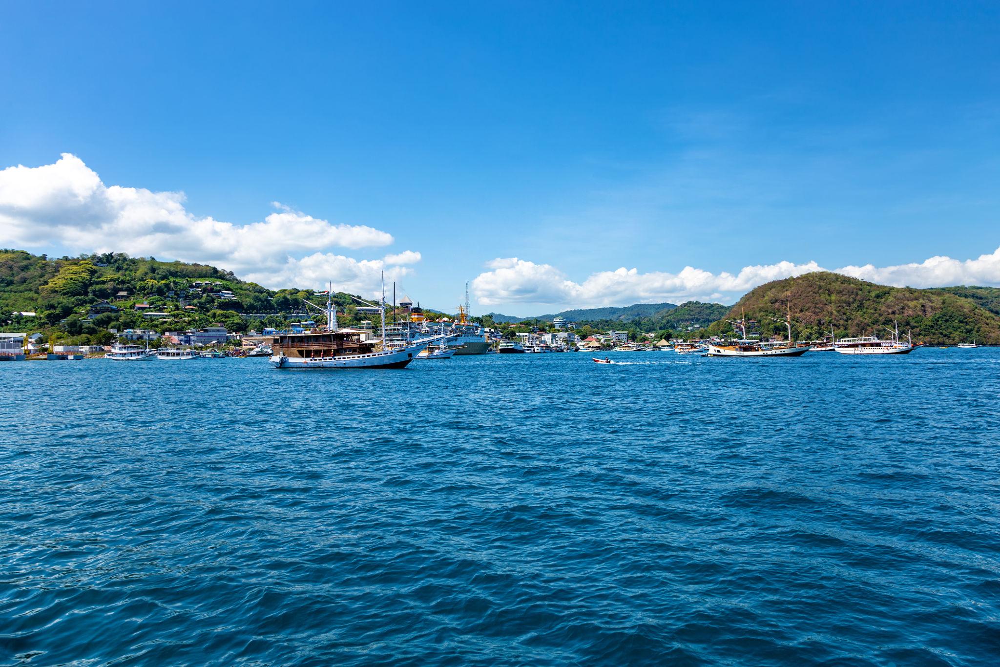 Phinisi boats anchored in the bay of Labuan Bajo, Flores